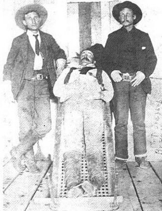 Deputy US Marshals William Banks (left) and Isaac S. Prater (right) killed William "Tulsa Jack" Blake (center) near Dover, Oklahoma Territory, 1895