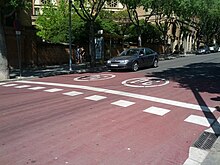 Two-lane red 30 km hr pavement markings (18493958632).jpg