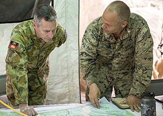 Gilmore (left) discusses troop movements with a United States Marine Corps major during a training exercise in the Northern Territory, August 2015. U.S. Marines with Marine Rotational Force - Darwin and Australian Army soldiers train together during Exercise Crocodile Strike 150826-M-HL954-029.jpg