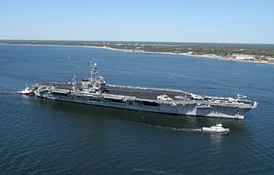 US Navy 040317-N-0000N-036 USS John F. Kennedy (CV 67) arrives at Naval Air Station Pensacola, Fla., for a four-day port visit.jpg