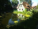 Wolfegg - pond and house in the farmhouse museum.jpg