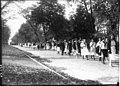 Women marching to Miami-Ohio Wesleyan football game 1921 (3191630612).jpg