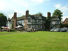 The Grade II listed Worsley Old Hall. Parts of the building date back over 900 years. It was the original manor house of Worsley Manor[11] and is now a restaurant.