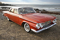 1961 Plymouth Fury sedan, orange and white.jpg