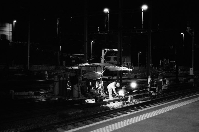 File:1 Rail track welding Bellinzona 180818 M3 Summitar 5cm K400.jpg