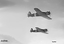 Italian Macchi C.200 fighter aircraft during the war A formation of Macchi C.200s escorting bombers.jpg