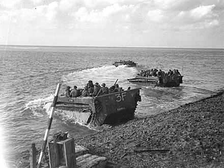 Amphibious vehicles of the First Canadian Army cross the Scheldt, in the effort to open shipping routes to Antwerp, September 1944.