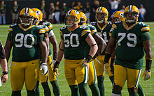 Ryan Pickett (right) with B. J. Raji and A. J. Hawk. BJ Raji, A. J. Hawk and Ryan Pickett - San Francisco vs Green Bay 2012.jpg