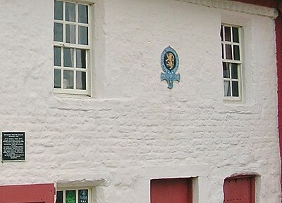 Detail of the front of the club, including a Fire Mark. Bachelors' Club, Tarbolton, detail.JPG