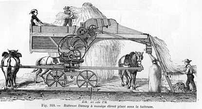 Une batteuse utilisant la force animale (carrousel) en 1881.