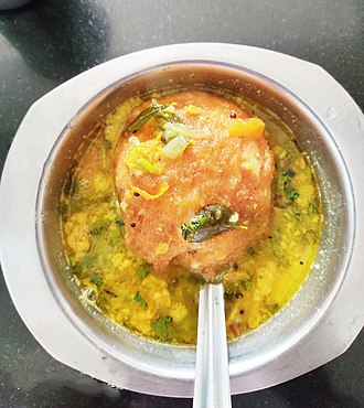 Bonda soup, Urad dal bonda served with hot dal soup Bonda soup.jpg