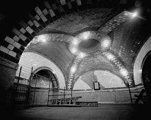 The mezzanine at the subway station underneath City Hall City Hall station control room.jpg