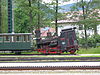 Schneeberg cog railway steam locomotive, with tilted boiler, on level track