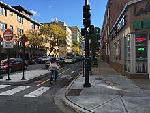 Contraflow parking-protected bikeway (37975294031).jpg