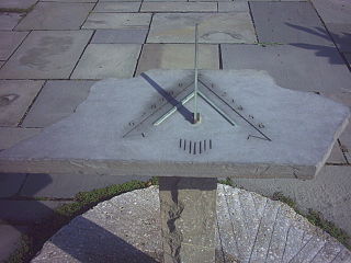 A closeup of a sundial at Cornell Plantations in Ithaca, New York.