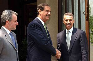 Santiago Creel (left), President Vicente Fox and Roberto Madrazo (right). Creel Fox Madrazo.jpg