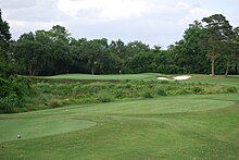 Hole 4 on the Cypress Creek course at Champions Golf Club Cypress Creek hole 4.jpg