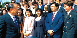 Ikeda greets international students at Soka University, March 1990