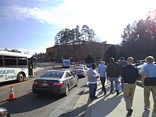 Carolina fans walking to the Smith Center along Skipper Bowles Drive in January 2012. DeanDome Walk.JPG