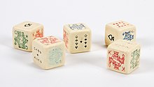 A set of poker dice from the 1940s, of the type originally used for balut Dice, game (AM 2015.20.16-2) (cropped).jpg