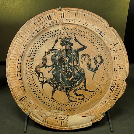 Immortal Thetis with the mortal Peleus in the foreground, Boeotian black-figure dish, c. 500–475 BC - Louvre.