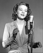 Dorothy Shay (pictured in the 1940s) was the first female singer to top the chart with Dorothy Shay Sings. The album spent five weeks at number one. Dorothy Shay circa 1940s.jpg