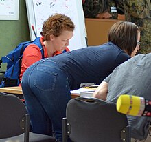 Eva Rosken and Selina Gschwandtner writing autographs at the Clothing of the German olympic team. Einkleidung der deutschen Olympiamannschaft Rio 2016 Medientag Hannover 0244.jpg