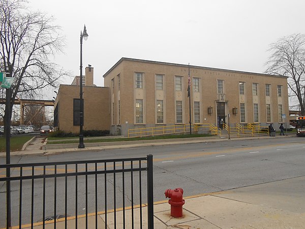 Holmes' Castle, located just to the left of the Englewood Post Office building on the corner