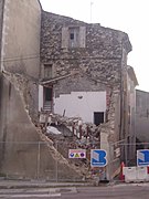 Maison partiellement détruite sur l’avenue Vaillant Couturier, à côté de l’église Saint-Etienne de Mélas.