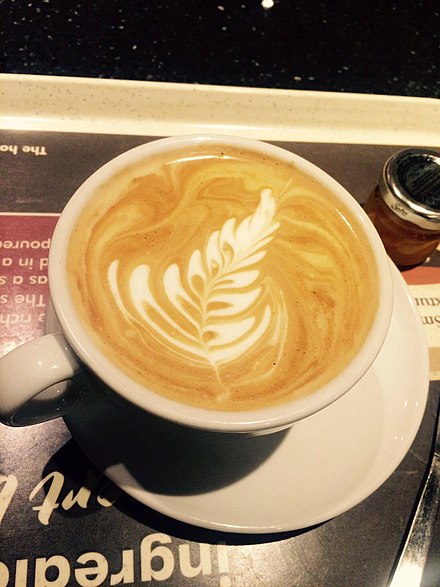A flat white with latte art