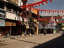 Chinese lanterns in Little India, George Town, ushering in the Chinese New Year. GEORGETOWN PENANG NEAR LITTLE INDIA,WITH CHINESE NEW YEAR DECORATIONS MALAYSIA JAN 2012 (6794334588).jpg