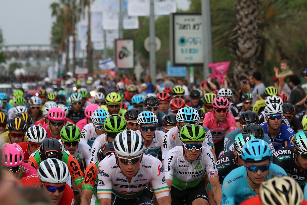 In a road bicycle race, the peloton (from French, originally meaning 'platoon') is the main group or pack of riders. Riders in a group save energy by 