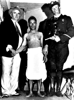 Giuseppe Zangara after his arrest GiuseppeZangara.png