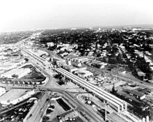 Metrorail viaduct under construction at Douglas Road in Coral Gables during the early 1980s Guideway construction.jpg