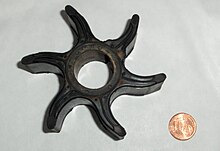 Flexible impeller of cooling system pump of an outboard engine (Coin for comparison, diameter 16.25 mm) Impellerrad.jpg