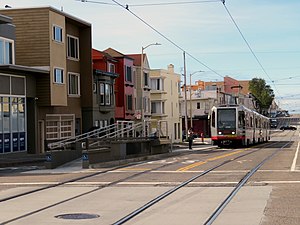 Inbound train at Judah and 28th Avenue station, February 2018.JPG