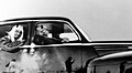 King Abdulaziz and Prince Faisal Travelling in a Car.jpg