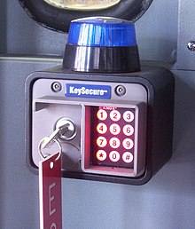 A Knox KeySecure, attached inside the cab of a fire engine, holds a high-security key to open KnoxBox key boxes in the area. Knox KeySecure.jpg
