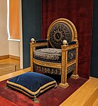 Throne of Napoleon I; by Georges Jacob and François-Honoré-Georges Jacob-Desmalter; 1804; embroidered velvet, gilt wood and ivory; height: 1.2 m; Louvre[10]