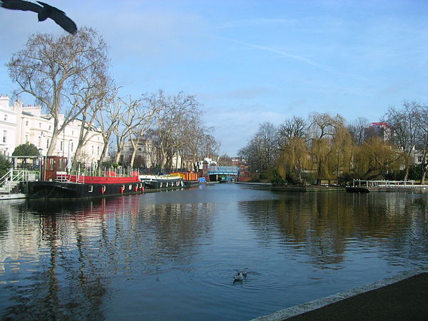 Little Venice basin viewed from the western end looking north-east towards the Regents Canal corner, with the island on the right and white Regency st