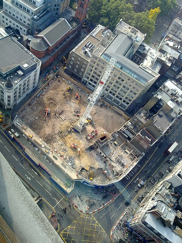 The Tottenham Court Road construction site (2009) on the former site of the Astoria, the green of Soho Square is seen at the top