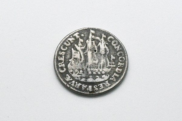 Token coin found in Borneo with the motto concordia res parvae crescent.