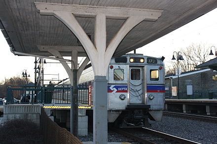 A SEPTA Regional Rail train in Cheltenham, Pennsylvania, a form of commuter rail