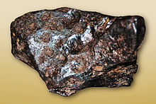 Example of a small (90mm) fragment of the meteorite Meteorite fragment from the Canon Diablo Meteorite.jpg
