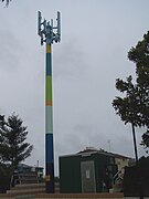 A mobile phone tower in Kangaroo Point, Queensland, painted to resemble an Aboriginal talking stick.