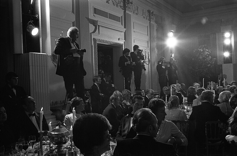 File:Photograph of Press Photographers Working at the Back of the State Dining Room during a State Dinner in Honor of Chancellor Helmut Schmidt of the Federal Republic of Germany - NARA - 7462081.jpg