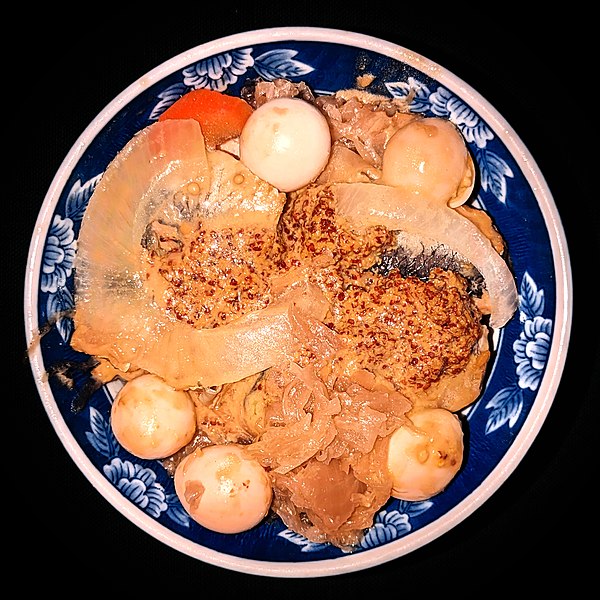 File:Pickled herring and quail eggs on sauerkraut, with mustard and black pepper - Massachusetts.jpg