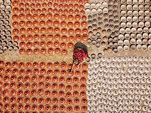 Finished pottery products kept for drying in the sun. Pottery Making in Bangladesh.jpg