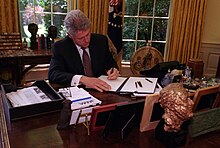 President Bill Clinton signs Executive Order 13087 in the Oval Office at the White House, May 1998 President Bill Clinton signs Executive Order 13087.jpg