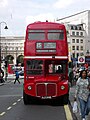 RM1941 24 August 2012 Parked up with a driver but with hazard lights on at the back of Stop E; blinds set for Tower Hill